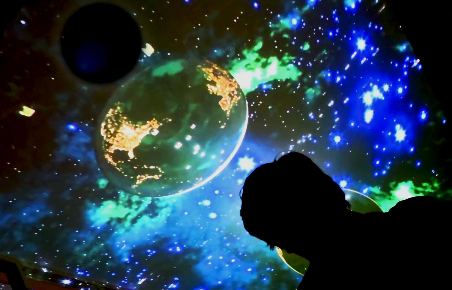 Looking up at outer space.